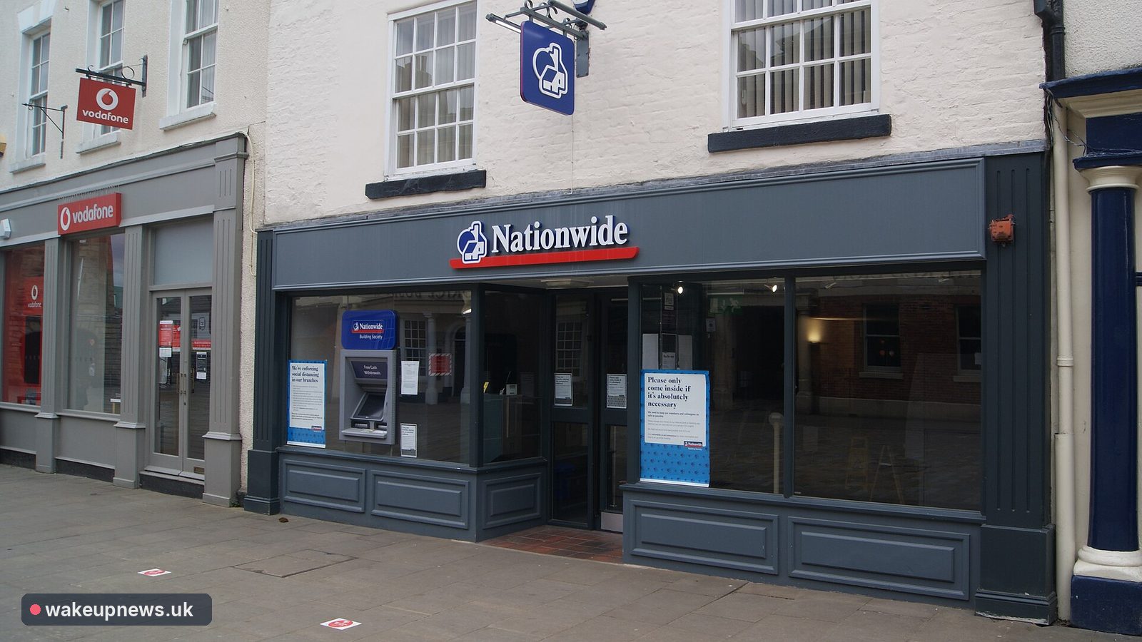Nationwide Building Society branch shopfront with cash machine on a town market place
