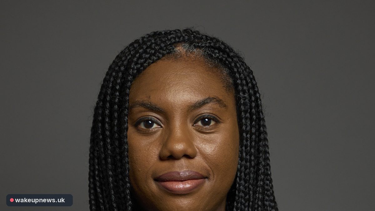 Official portrait of Conservative leader Kemi Badenoch against a grey background